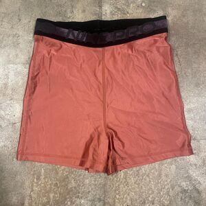 nike pro rose gold with black and holographic purple logo waistband size medium